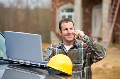 contractor-happy-ERTC-business-owner-speaking-phone